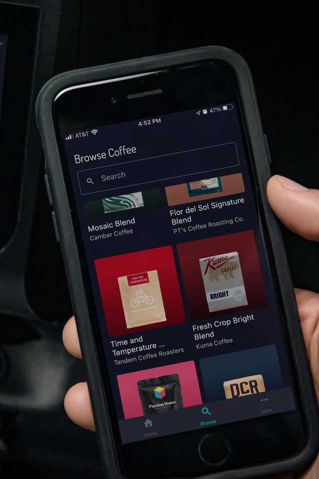LUCCA Atom 75 Espresso Grinder in black iphone TrueGrind App up close - knockout